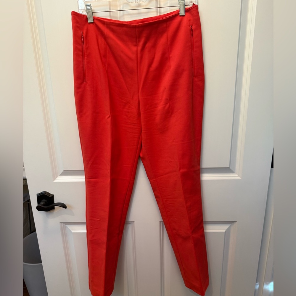 AKRIS side zip poppy color pants. Size 10